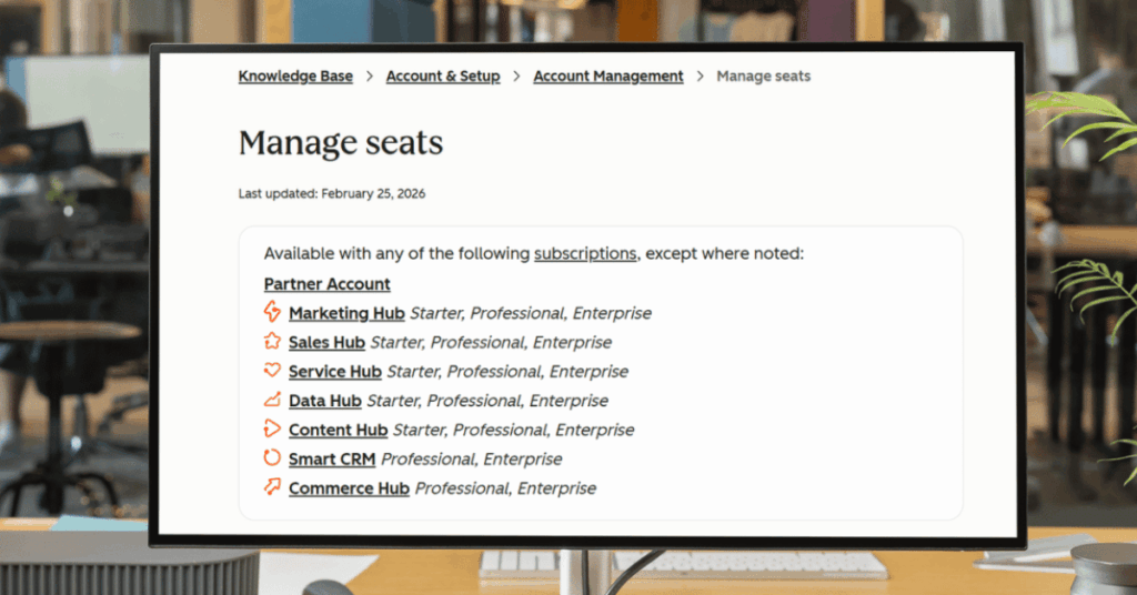 HubSpot knowledge base showing seat management options across Marketing, Sales, Service, and Data Hubs