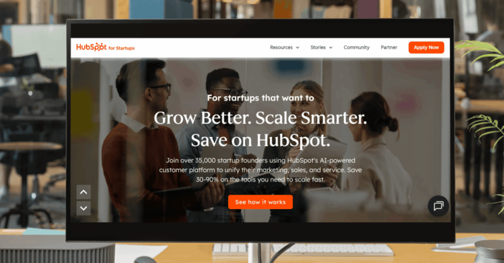 HubSpot for Startups page with headline Grow Better Scale Smarter and startup founders in background
