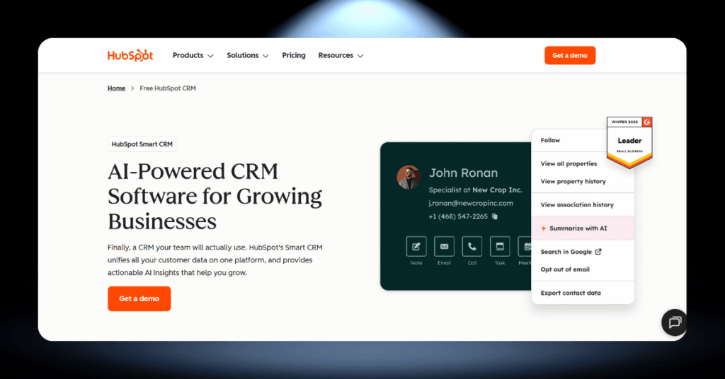HubSpot Smart CRM contact record showing customer details, deal history, and AI-powered data enrichment tools