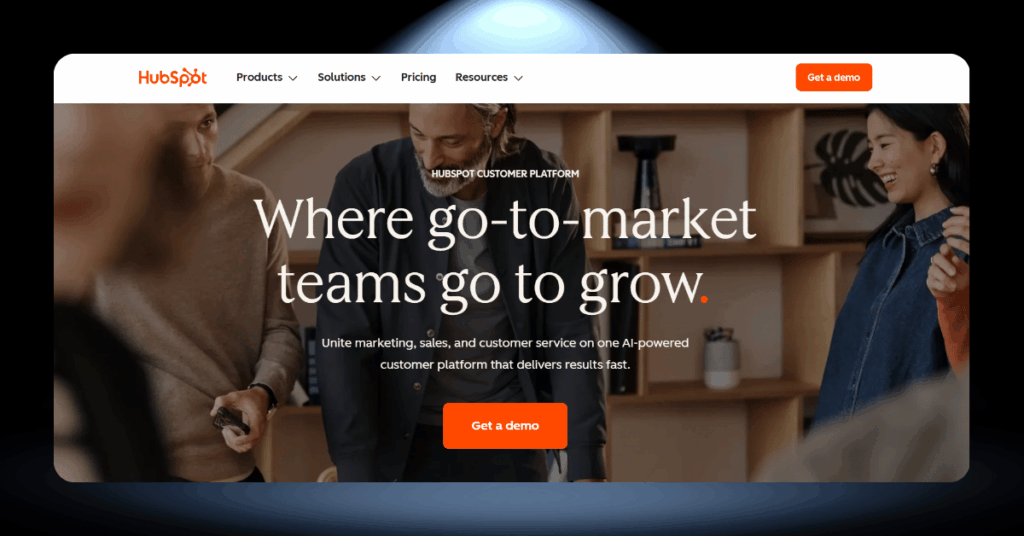 HubSpot customer platform hero section with tagline "Where go-to-market teams go to grow" and a Get a Demo button