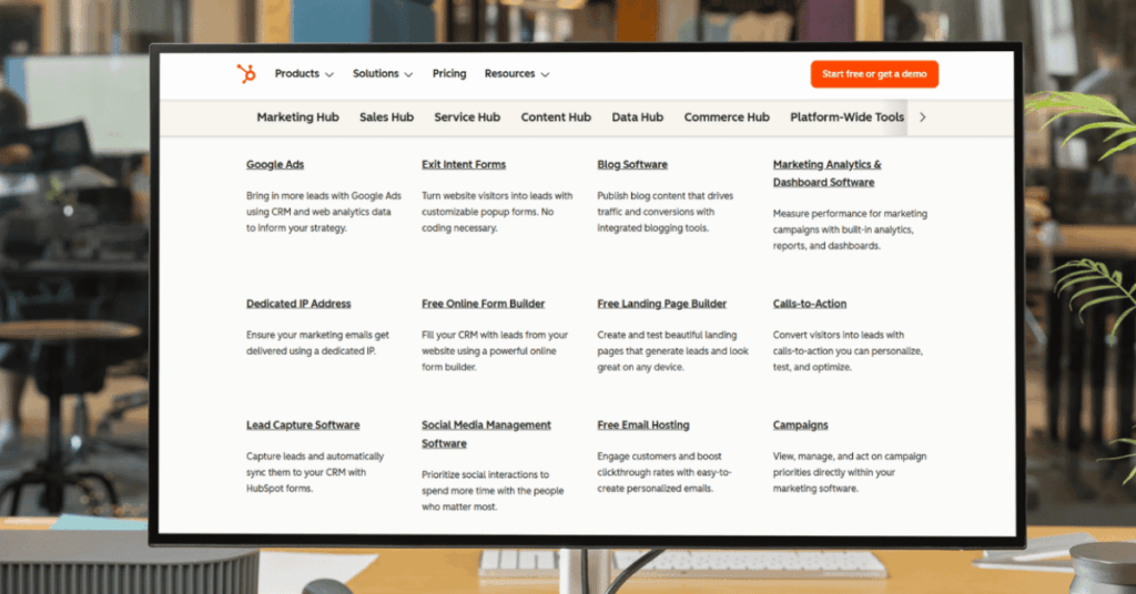 HubSpot Marketing Hub product dropdown menu displaying tools like Google Ads, forms, landing pages, and blog software